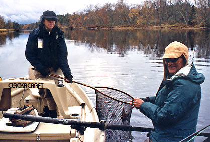 Tom Mikundo Guide & Lynn with netted Muskie